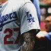 man in white and black jersey shirt