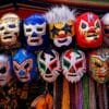 assorted-color of masks hanged on rod