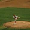 a baseball player throwing a ball