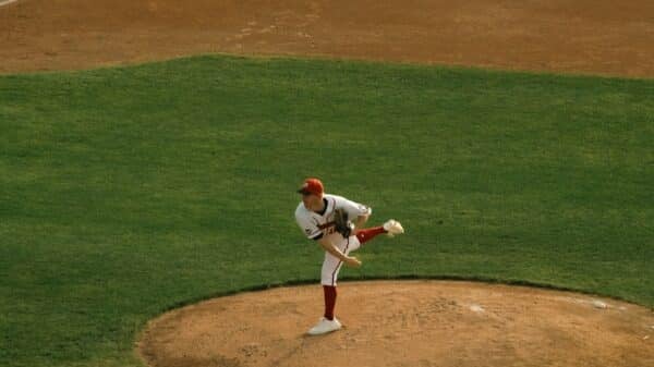 a baseball player throwing a ball